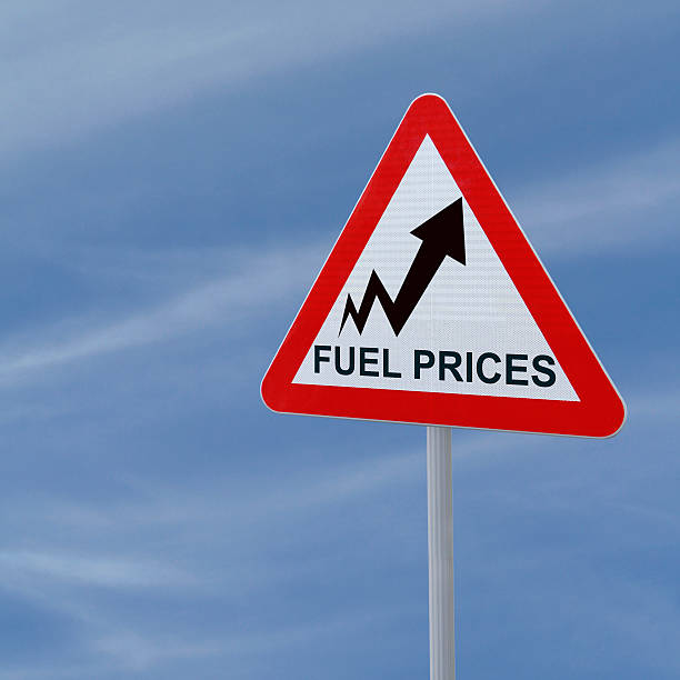 Fuel Prices Going Up Road sign showing increasing trend of fuel prices fuel prices photos stock pictures, royalty-free photos & images