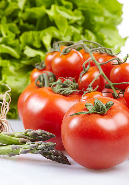 tomatoes with vegetables stock photo