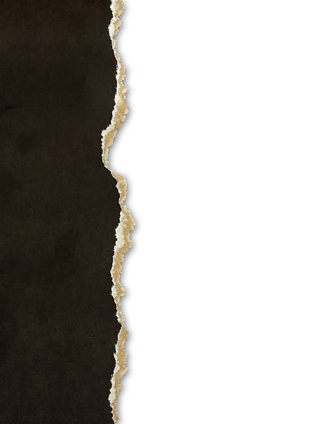 istock A piece of torn black paper on a white background 177008413