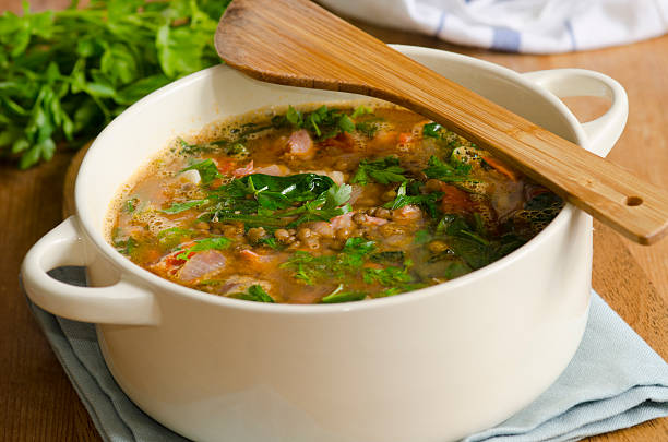 Italian soup "Delicious puy lentil, spinach and bacon soup" vegetable soup stock pictures, royalty-free photos & images