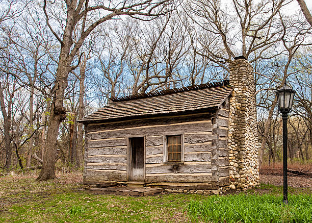 istock Log cabin in the woods 177009400