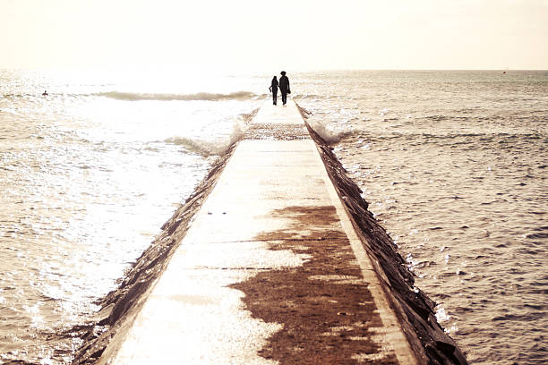 istock Sunlit Ocean Path Sky Horizon Waves People 177009538