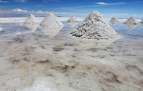 "Piles of salt on the surface of the Salar de Uyuni salt lake, Bolivia"