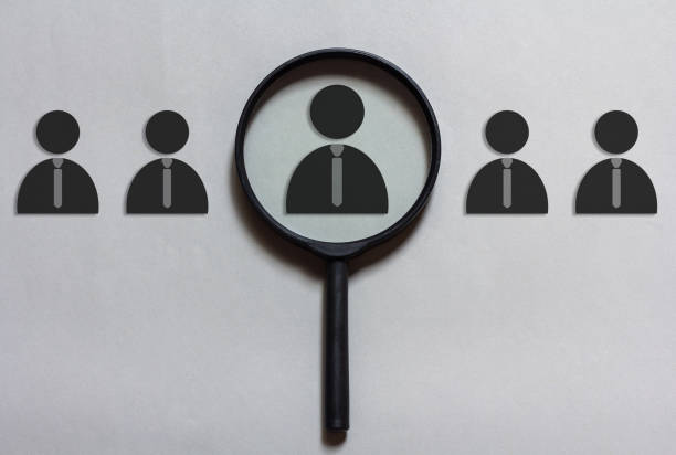 istock magnifying glass focus on manager icon 1770101124