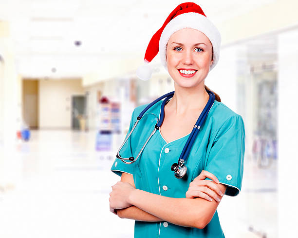 istock doctor wearing Santa hat 177010145