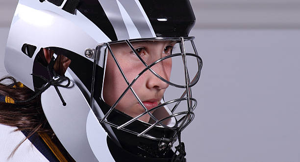 istock Young girl in goalie mask 177010153