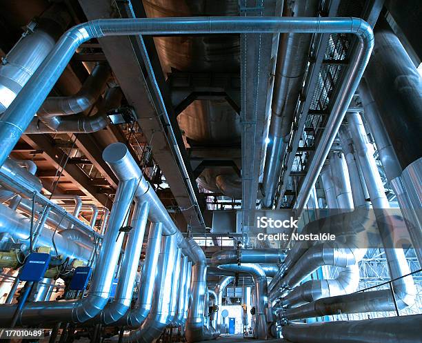 Industrial Zone Steel Pipelines And Cables In Blue Tones Stock Photo - Download Image Now