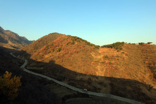 istock The mountain road is in late autumn 1770108242