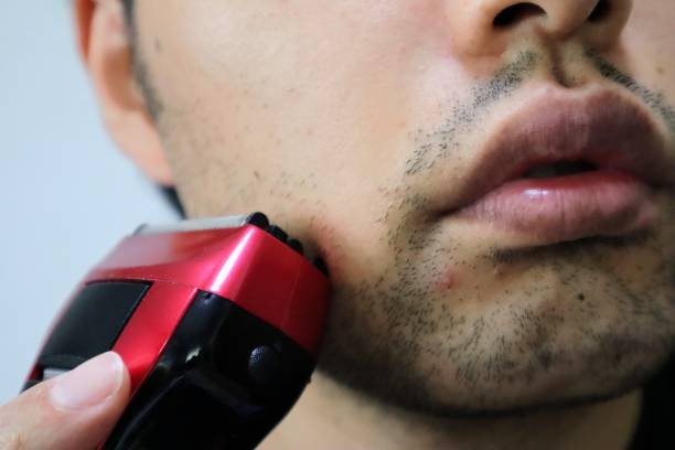 istock Japanese man shaving with an electric razor 1770110915