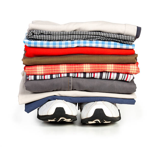 istock pile of clothes on the shoes 177011375
