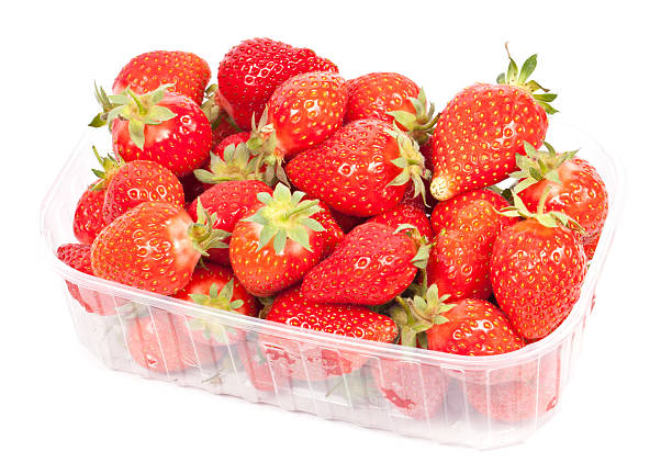 istock Fresh ripe strawberries in a plastic containter on white 177011936