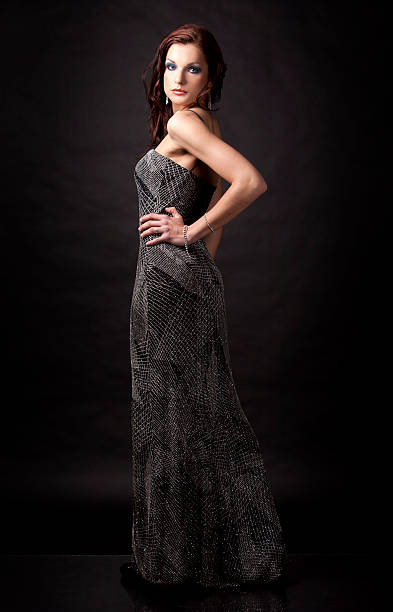 istock brunette in long dress 177012310