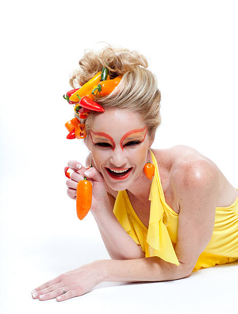 istock Beautiful Woman with Peppers 177012668