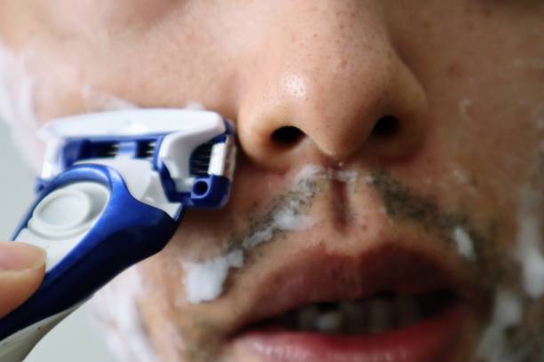 istock Japanese man shaving his beard 1770127380