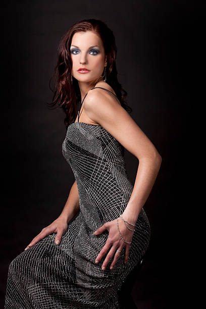 istock brunette in long dress 177012807