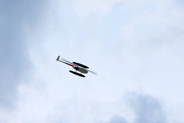 istock Helicopter flying in the blue sky 177012876