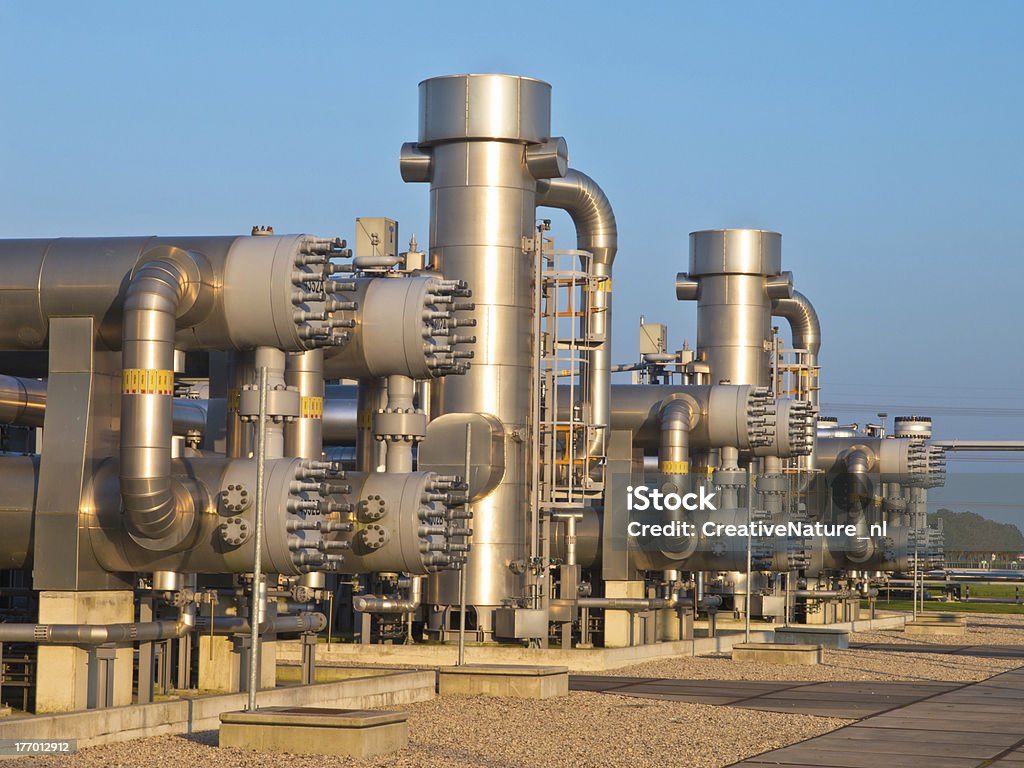 natural gas processing site natural gas processing site during sunset Blue Stock Photo