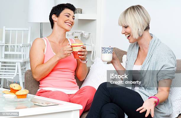 Two Happy Woman Friends Stock Photo - Download Image Now - 30-39 Years, Adult, Adults Only