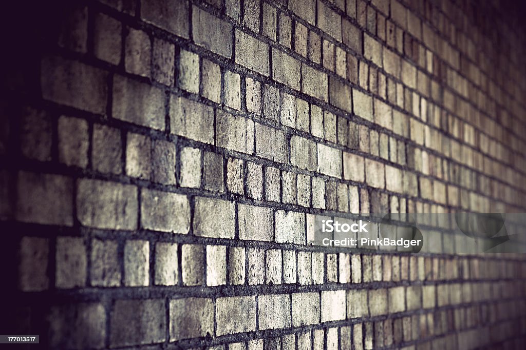 grunge brick wall grunge brick wall with diminishing perspective Architectural Feature Stock Photo