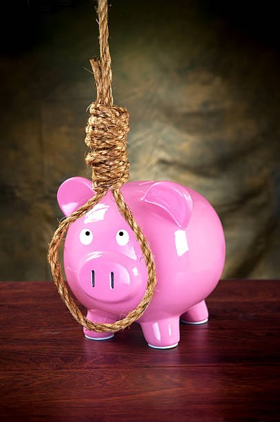 istock Piggybank and noose 177014287
