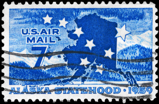 In 2008, the post office issued four stamps showing the Flag at different times of day