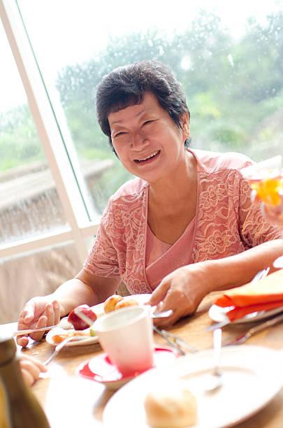 istock Senior woman enjoying her dining 177015382