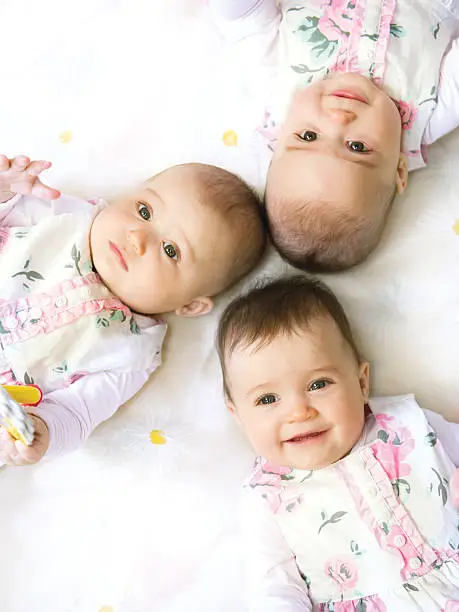 Baby triplets portrait view from above