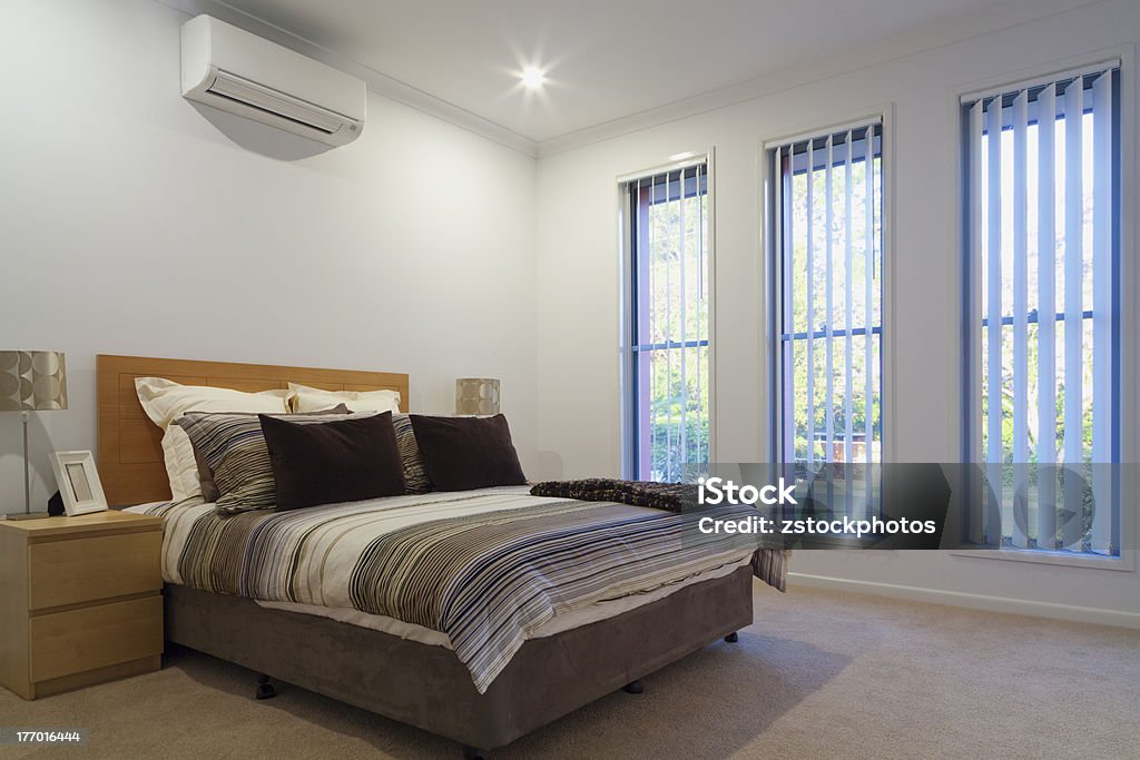 Double master bedrrom New double bedroom with pillows and covers Apartment Stock Photo