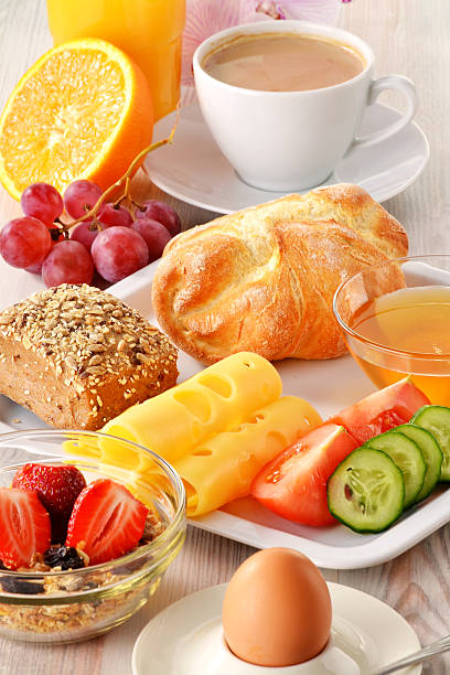 istock Breakfast with coffee, rolls, egg, orange juice, muesli and chee 177016496