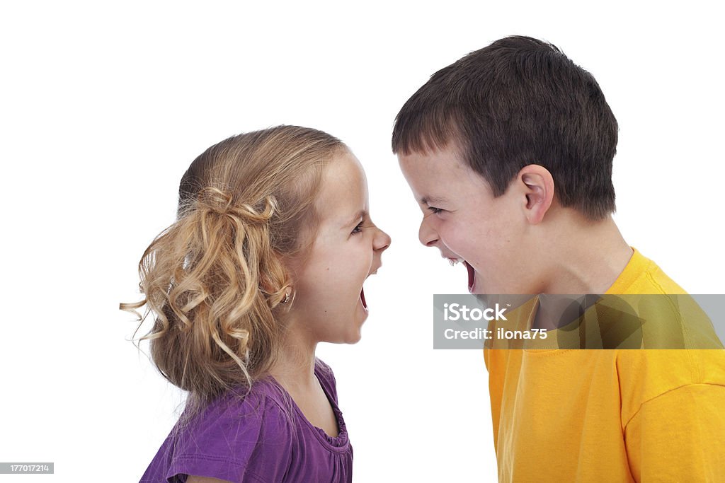 Raging kids - isolated Raging kids - children shouting to each other, isolated Child Stock Photo