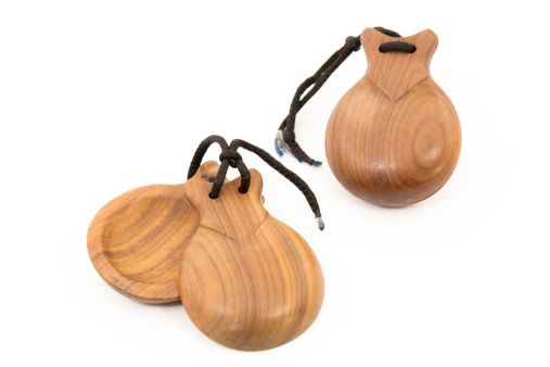 Spanish castanets typical musical instrument with white background