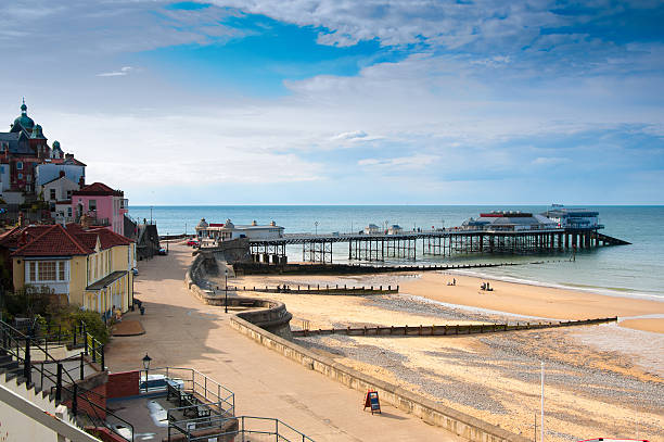 Cromer, seaside town in Norfolk, England A view of promenade, town centrem, and pier, Cromer, seaside town in Norfolk, England groyne photos stock pictures, royalty-free photos & images