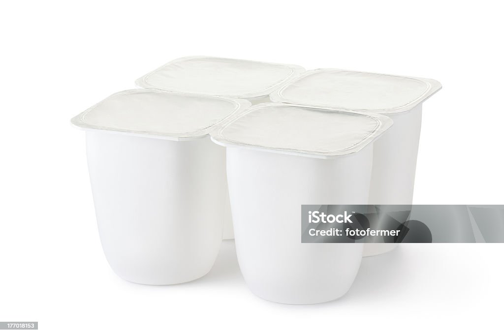 Quatre Récipient en plastique pour produits laitiers avec couvercle de survie - Photo de Tasse libre de droits