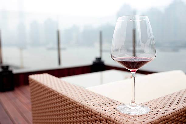 istock Cup  wine  in front of  huangpu river 177018650