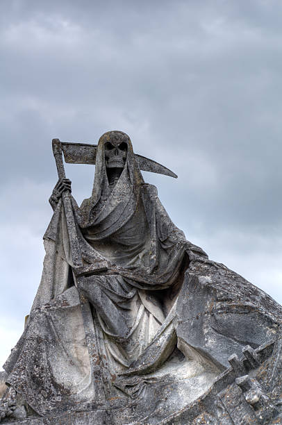 Grim reaper statue stock photo