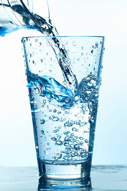 istock Pouring Water in the Glass With Bubbles. 177020428