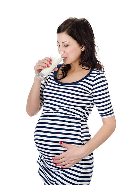 istock Pregnant woman drinking milk 177020844