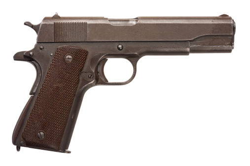 A well used American-made .45 1911A1 semi-automatic military pistol from World War Two.