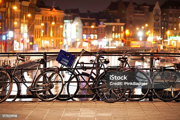 Bikes In Amsterdam Stock Photo - Download Image Now - Amsterdam, Bicycle, Bridge - Built Structure