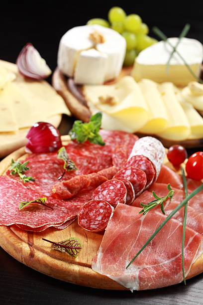 istock Salami and cheese platter with herbs 177022013