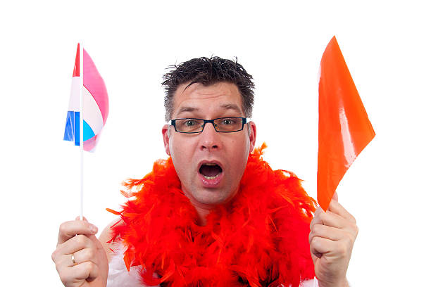 istock Man is posing in orange outfit for soccer game 177022015