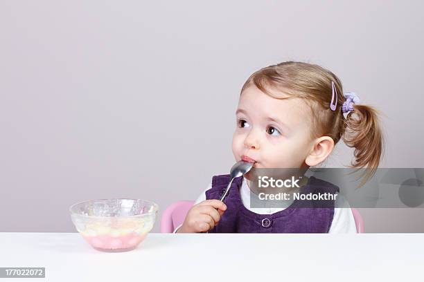 Baby Girl Having Fun While Eating Stock Photo - Download Image Now - Babies Only, Baby - Human Age, Baby Food