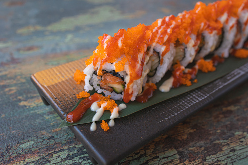 Closeup shot Traditional Japanese sushi with salmon and salmon caviar.