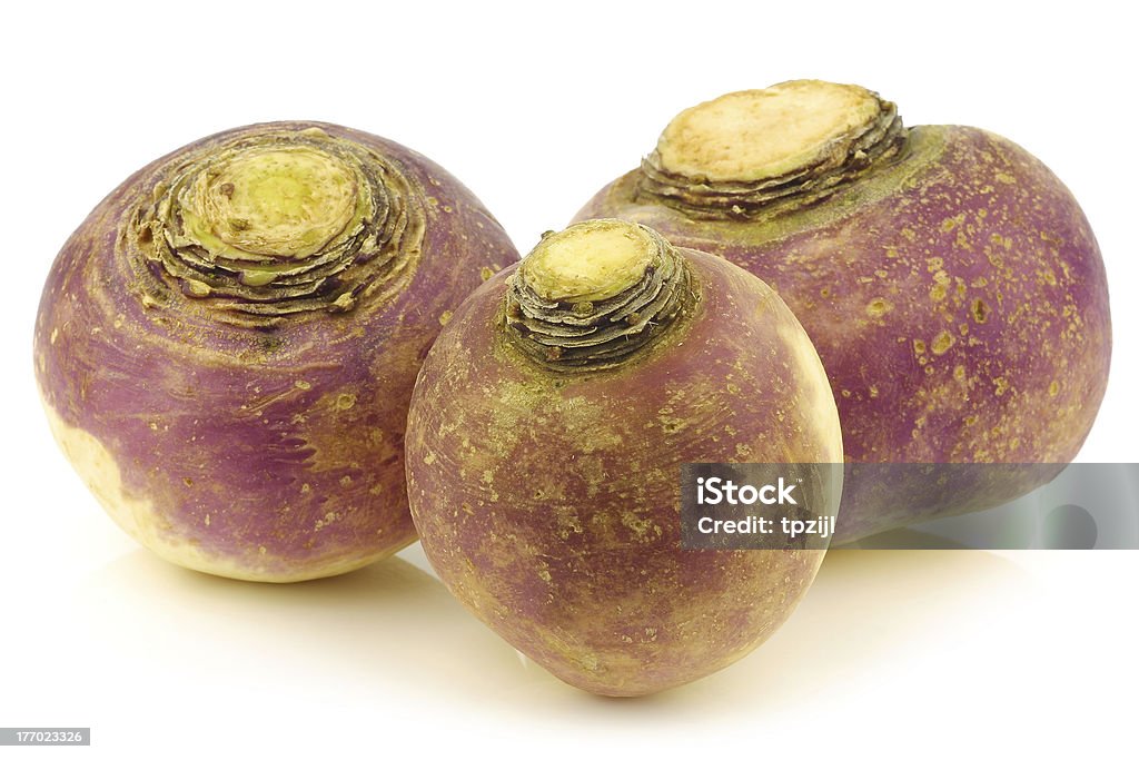 three fresh turnips fresh turnips on a white background Rutabaga Stock Photo