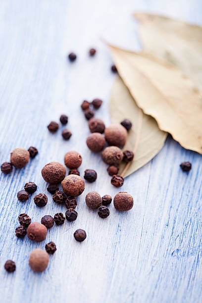 allspice, pepper and bay leaf stock photo