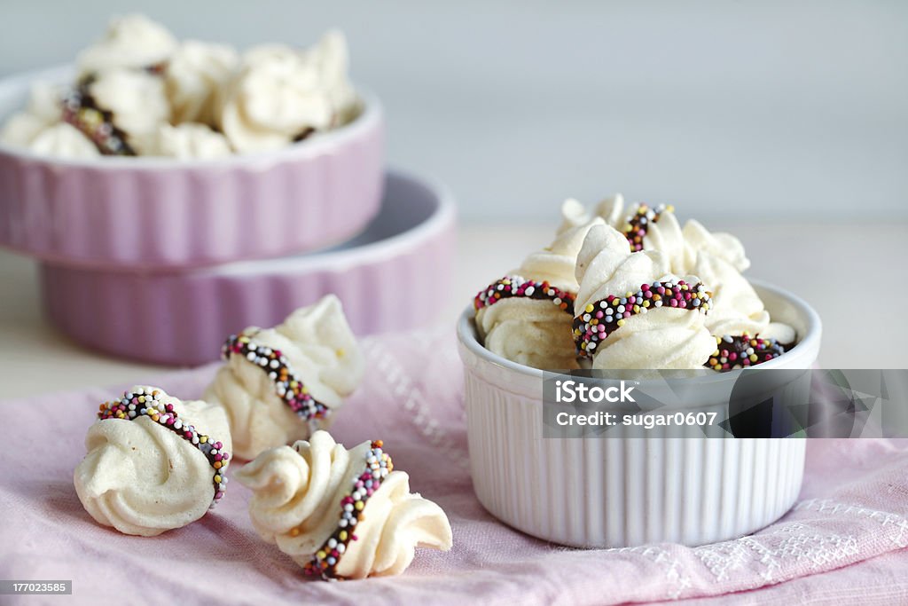 Spanish meringue candies with chocolate Spanish meringue candies with chocolate and colored balls Baked Stock Photo