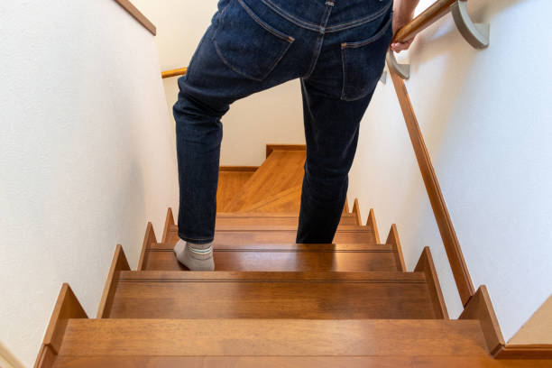 istock A person going down the wooden stairs 1770237276