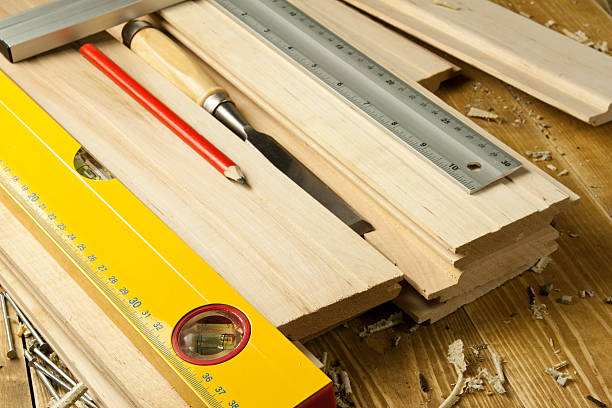 istock Carpenter's tools are on a wooden boards 177023736