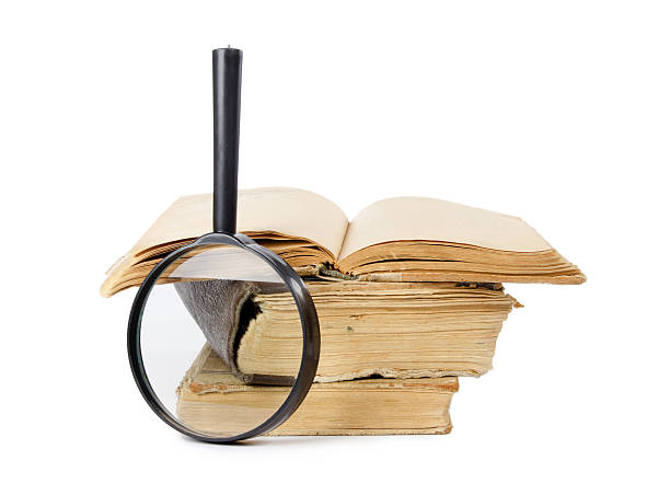 istock Pile of old books isolated on white background 177023965