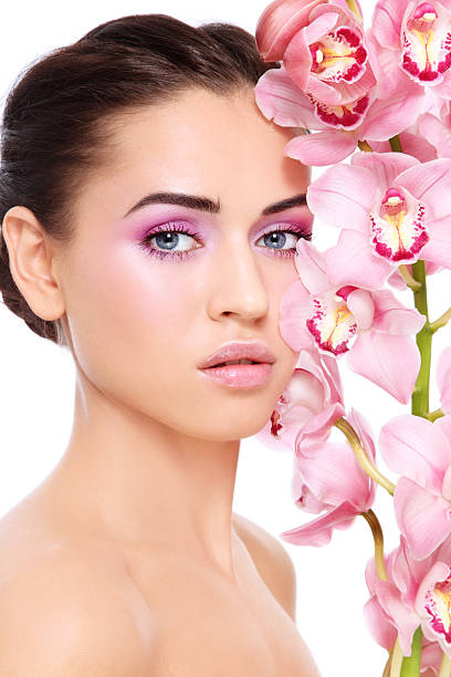 istock Girl with orchid 177024578